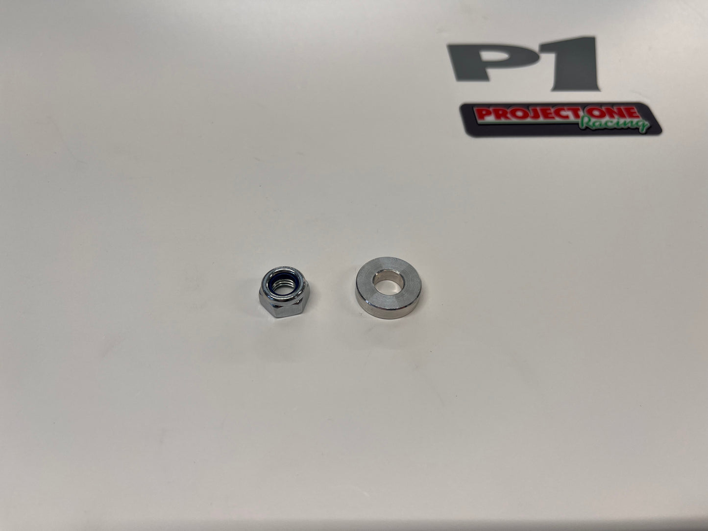 STUB AXLE ALLY SPACER & NUT -  P133