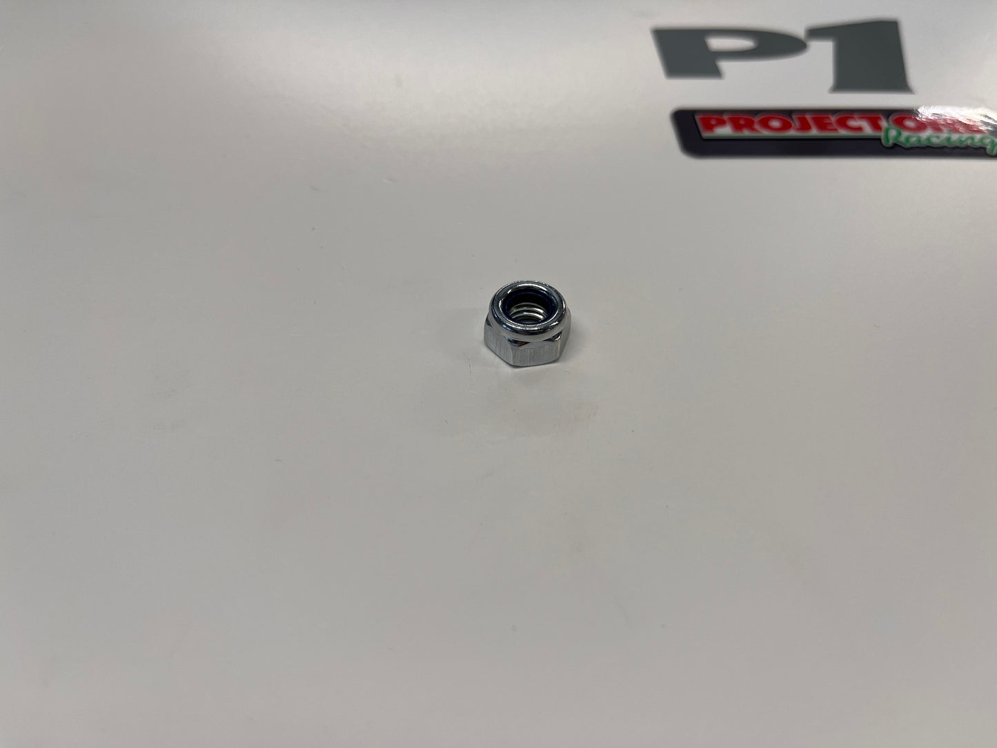 STUB AXLE NUT - P187